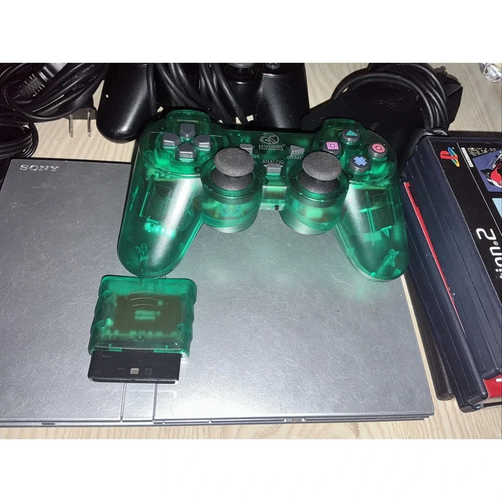 playstation 2 console,‎ 1 Wireless Controller 1 Reg Controller ,5 Games
